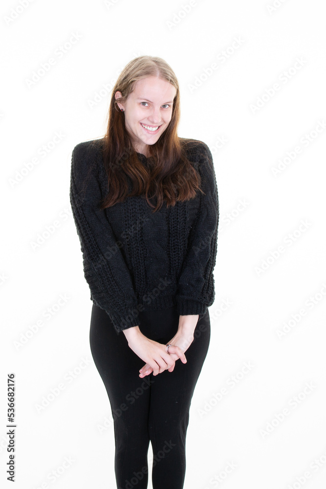 young beautiful blonde cute shy woman with her arms crossed in shyness young beautiful blonde cute shy woman with her arms crossed in shyness