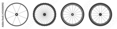 Black bicycle wheel symbols collection. Bike rubber tyre silhouettes. Fitness cycle, road and mountain bike. Vector illustration.