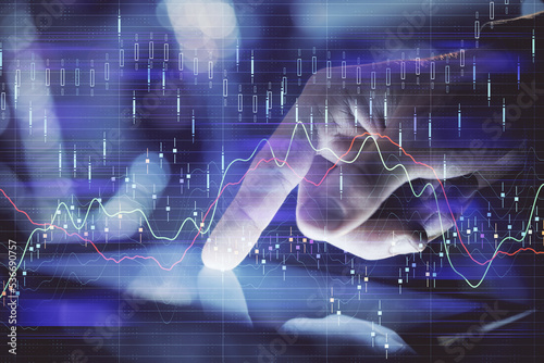 Multi exposure of man's hands holding and using a phone and financial chart drawing. Market analysis concept.