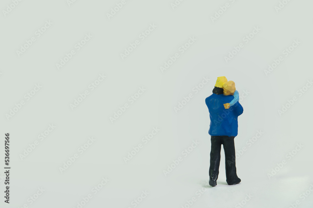 firefighter rescuing little child isolated on white background, back view firefighter rescuing little child isolated on white background, back view