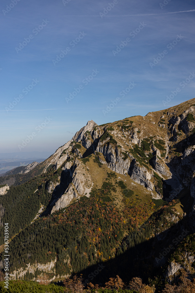 Mountain peaks in autumn. Tatra Mountains in Poland towards Czerwone Wierchy.