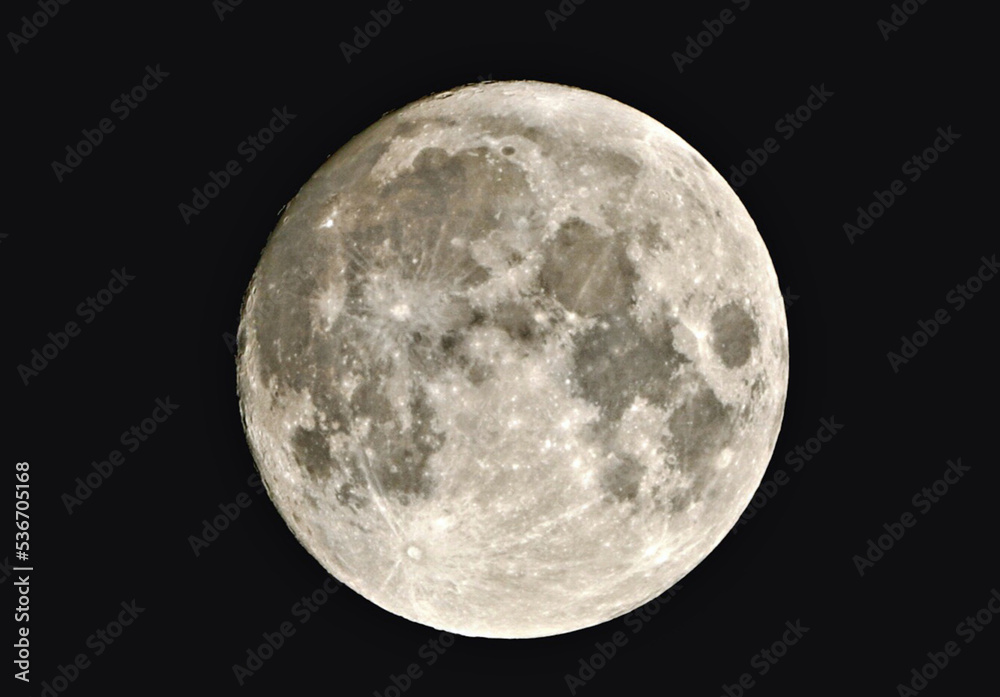 full moon shining with reflected light on a black background, visible craters, darker spots full moon shining with reflected light on a black background, visible craters, darker spots
