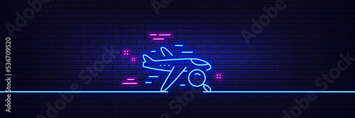 Neon light glow effect. Search flight line icon. Find travel sign. Magnify glass. 3d line neon glow icon. Brick wall banner. Search flight outline. Vector