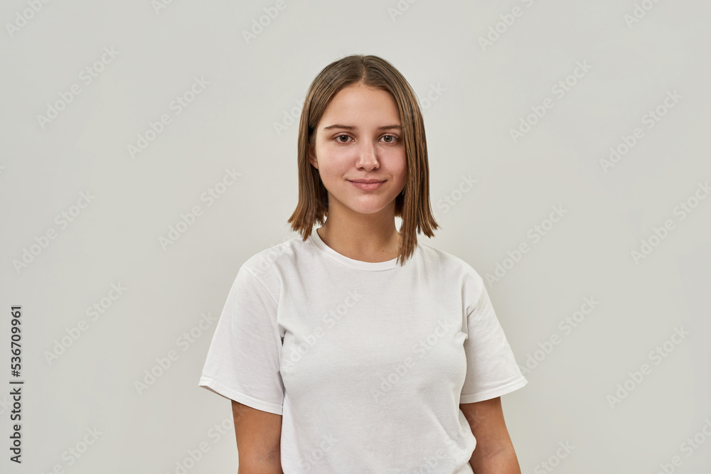 Portrait of smiling caucasian girl look at camera
