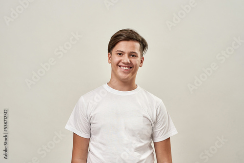 Cropped image of smiling caucasian teenage boy