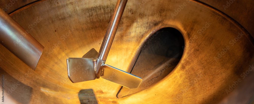 Distillery boiler, close-up of a copper still with a stainless steel  agitator taken at a gin distillery.Copy space for your design. Web banner.  Stock Photo | Adobe Stock