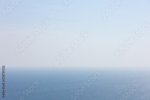 曇り空の海の水平線 photo