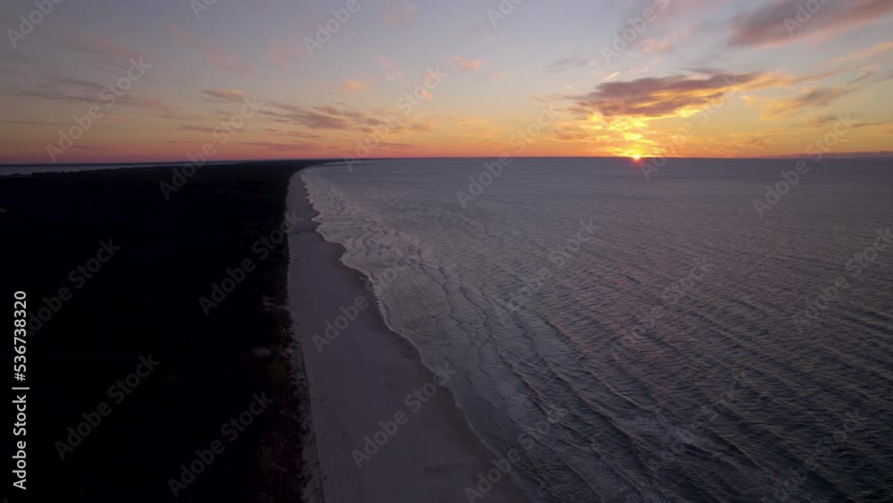 Long Sandy Shore Of Krynica Morska Beach At Dusk Near Gdansk, Northern Poland. Aerial Drone Long Sandy Shore Of Krynica Morska Beach At Dusk Near Gdansk, Northern Poland. Aerial Drone