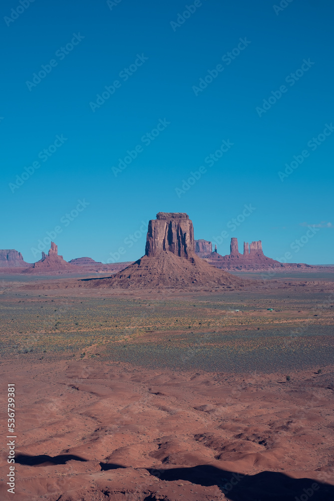 The sunny views of Monument Valley in Arizona The sunny views of Monument Valley in Arizona