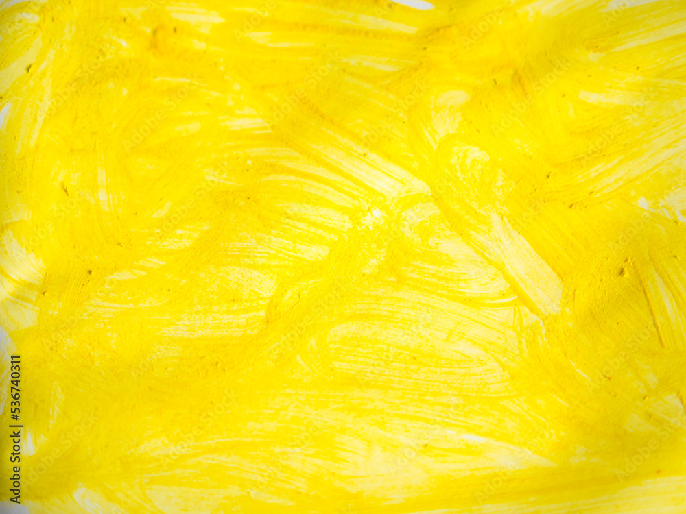 smeared yellow paint on paper space for text