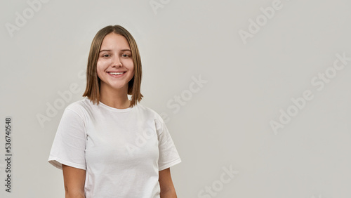 Partial of smiling caucasian girl look at camera