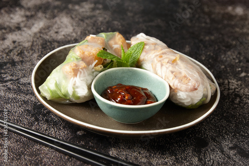 Close up shot of vietnamese fresh spring rolls with dipping sauce