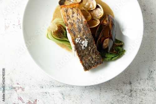 Salmon with clams and mussels photo