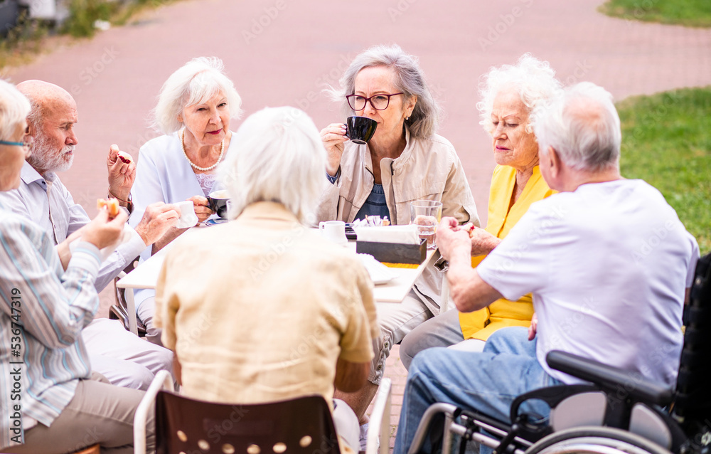 Group of seniors people bonding at the bar cafeteria Old elderly