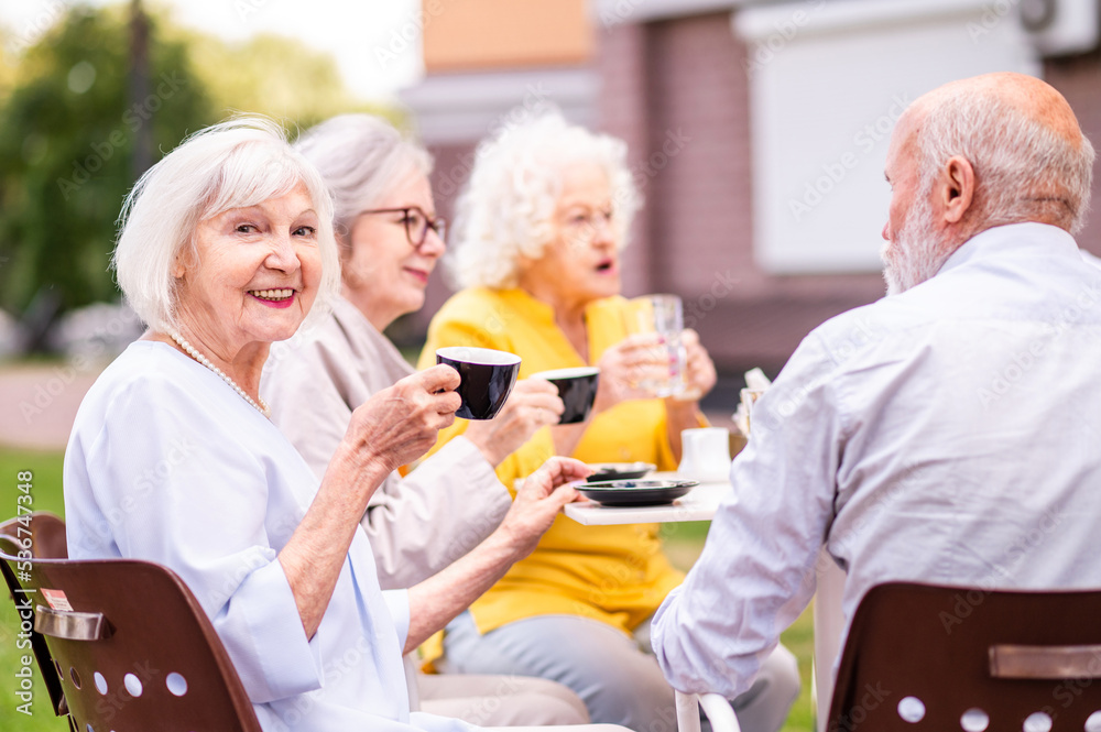 Group of seniors people bonding at the bar cafeteria Old elderly