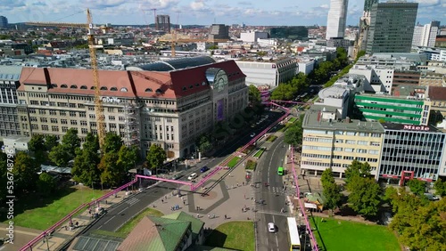 The start of the shopping street Kurfürstendamm.
magic aerial view flight static tripod drone
of Wittenberg Place, KaDeWe at Kudamm Berlin Germany at summer day 2022. 4k marnitz Cinematic photo