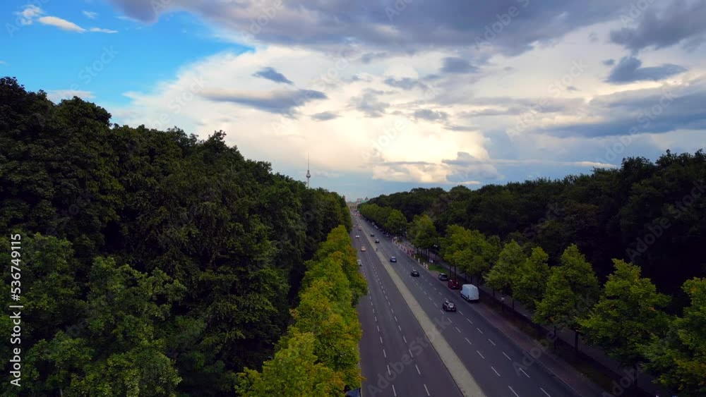 Long multilane road in Central Park.
Calm aerial view flight pedestal up drone
of 17th of June Street Berlin Germany at summer day 2022. 4k marnitz Cinematic Long multilane road in Central Park.
Calm aerial view flight pedestal up drone
of 17th of June Street Berlin Germany at summer day 2022. 4k marnitz Cinematic