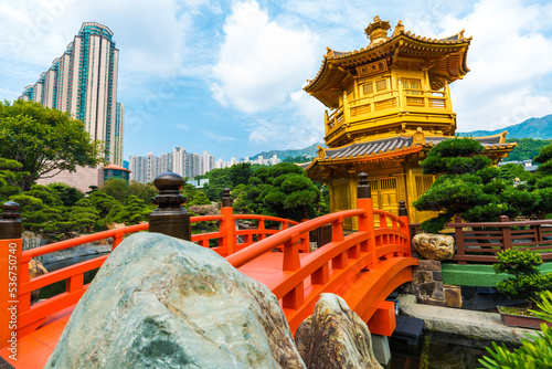 Photography Oriental gold pavilion green tree and pond in Nan Lian garden