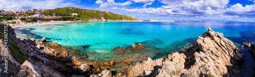 Italy summer holidays. Sardegnia island nature scenery. on e of the most beautiful beaches - Santa Teresa di Galura in northern part with turquoise sea and incredible rock formations photo