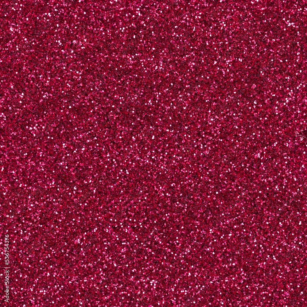 Red glitter, sparkle confetti texture. Christmas abstract background, seamless pattern. Elegant texture for Christmas design. Holiday, Xmas abstract pattern glitter with blinking lights.