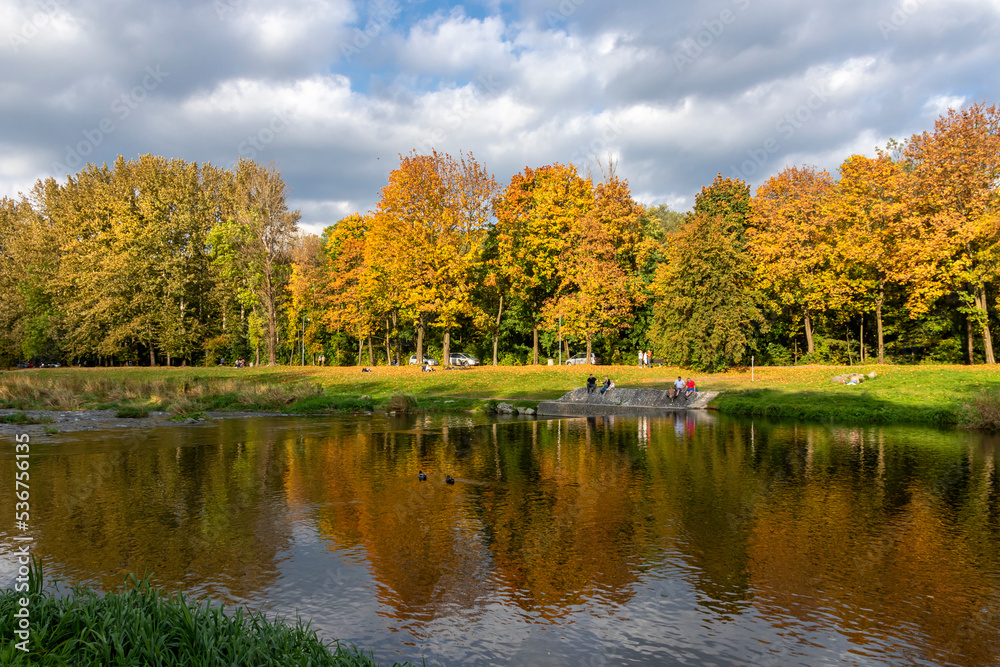 Autumn riverbank in saturated colors on a sunny day