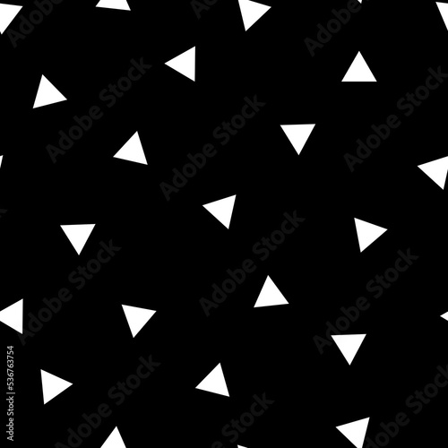 Seamless abstract pattern. small white triangles on a black background. vector texture. fashionable print for textiles, wallpaper .