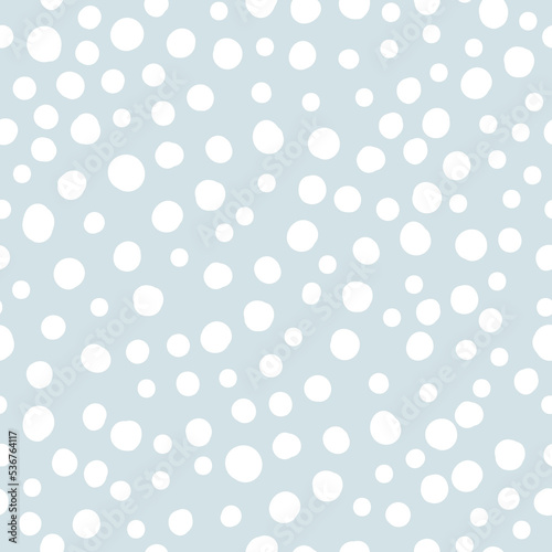 simple pattern is abstract. white dots, snow. light gray-blue background. Fashionable cute print for children's textiles, wallpaper and packaging.