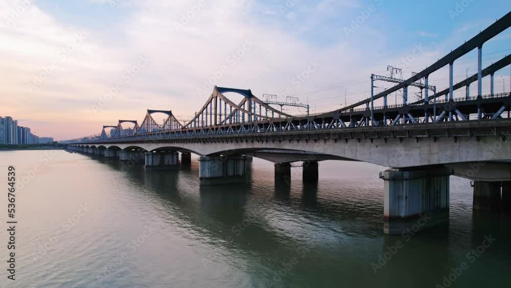 aerial view of steel bridge over qiantang river at twilight aerial view of steel bridge over qiantang river at twilight