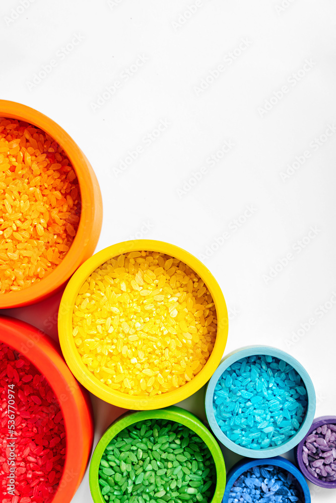 Bowls in rainbow colors with colored rice. Sensory bin toddler ...