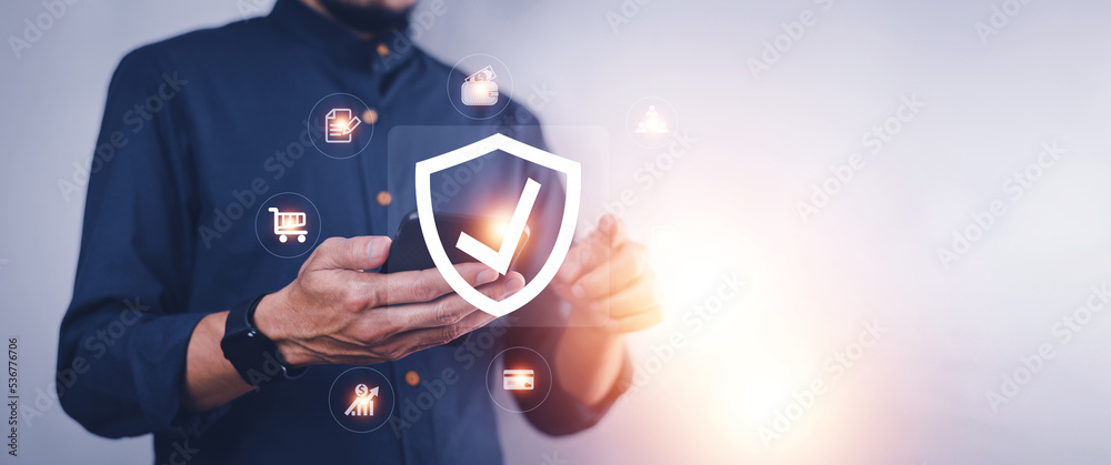 Man using mobile phone buy insurance online