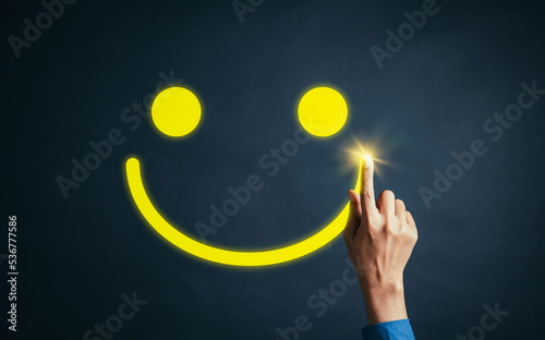 Hand user businessman touch giving smiley face best rating customer feedback and evaluation in experience service and product. Excellent rating. good business network score.