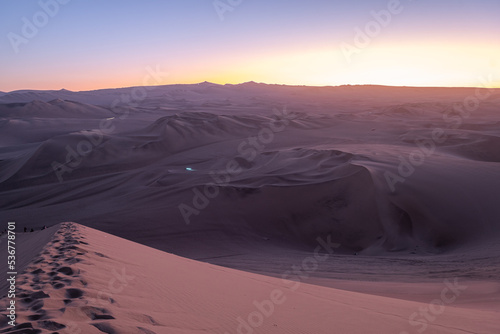 amazing sundown from a sand dune in a desert