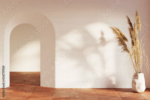 Modern interior with a sunbeam on the blank white wall, arched doorway, large ears of corn in clay vase, terracotta ceramic tile floor. Front view. 3d render photo