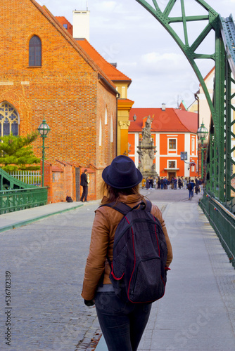 portrait of a happy woman in wroclaw city, poland