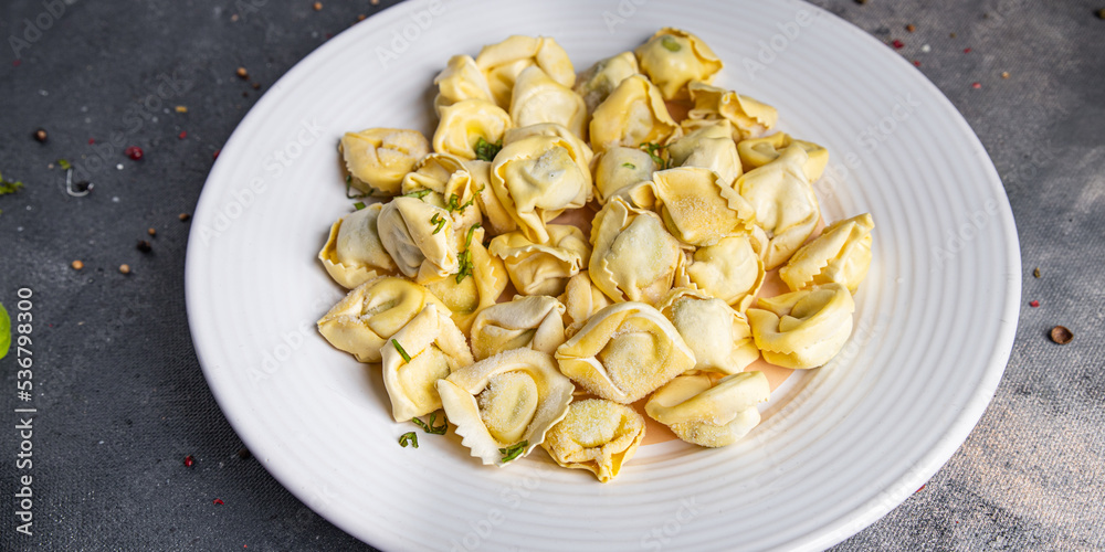 tortellini fish stuffed meal food snack on the table copy space food background vegetarian food tortellini fish stuffed meal food snack on the table copy space food background vegetarian food
