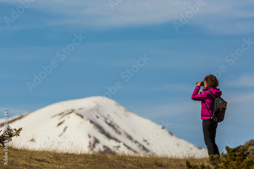 Young hiker girl enjoying in Capcir mountains, Pyrenees, France © Alberto Gonzalez 