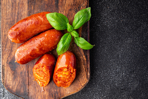 chorizo ​​sausages spicy sausage delicious snack meal food snack on the table copy space food background rustic top view photo