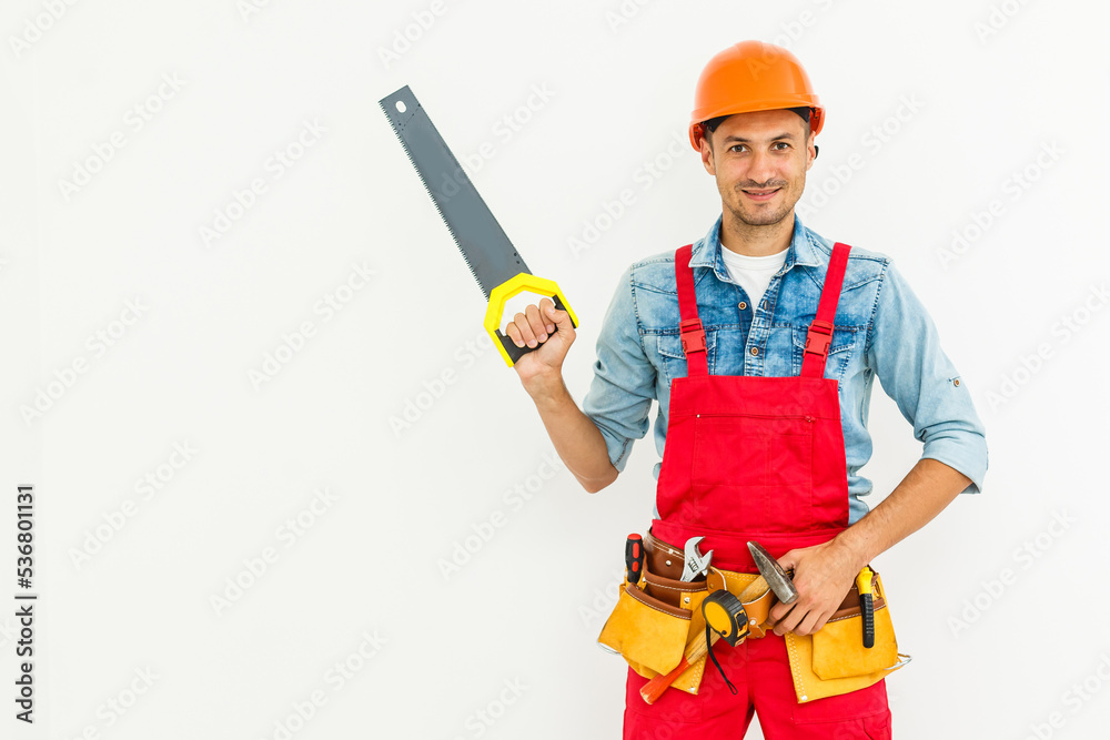 Young construction workers with hard hats on a white background