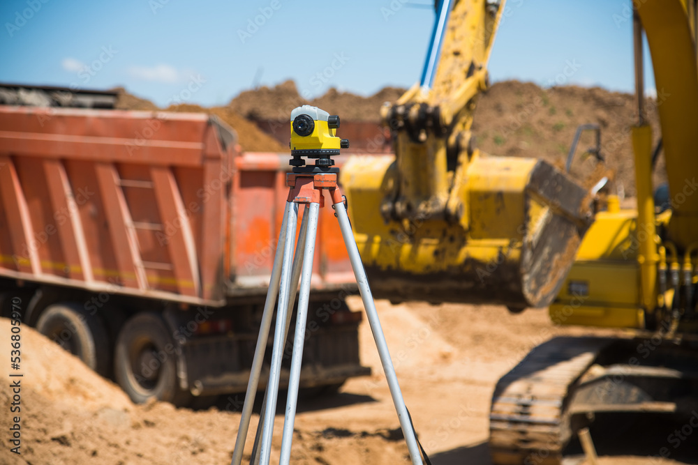 Surveyor equipment tacheometer or theodolite outdoors at construction site Surveyor equipment tacheometer or theodolite outdoors at construction site
