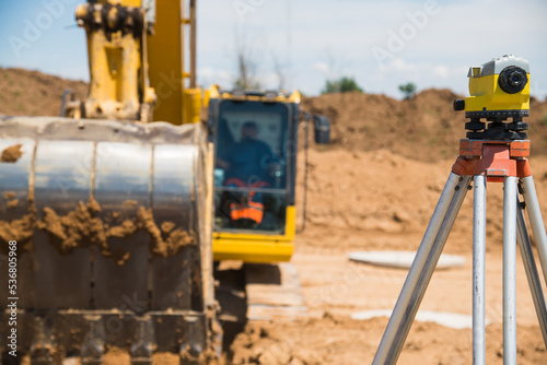 Surveyor equipment tacheometer or theodolite outdoors at construction site