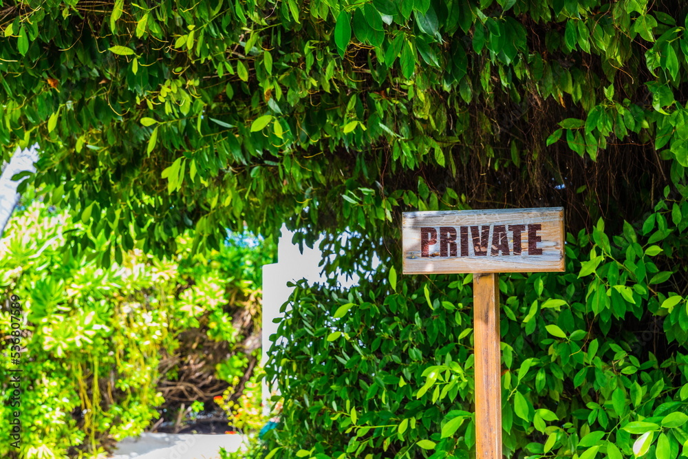 sign at the entrance to the bungalow of a resort hotel in the Maldives