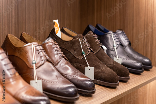 Leather shoes were lined up on the store shelves.