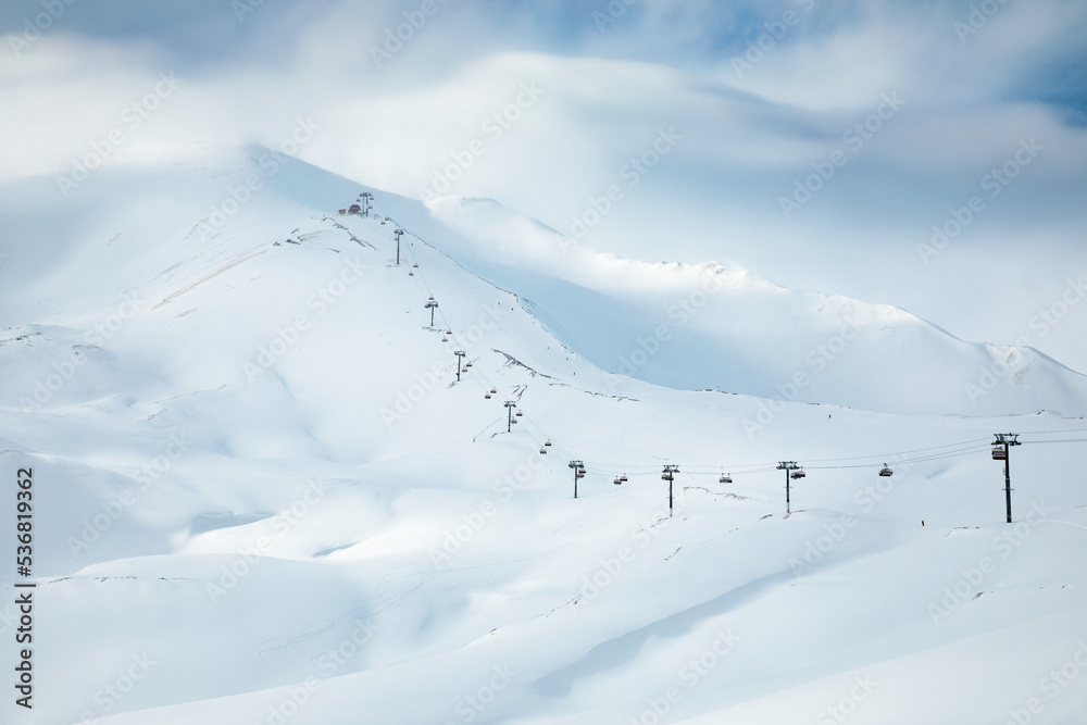 Minimalistic ski resort view with chairlift