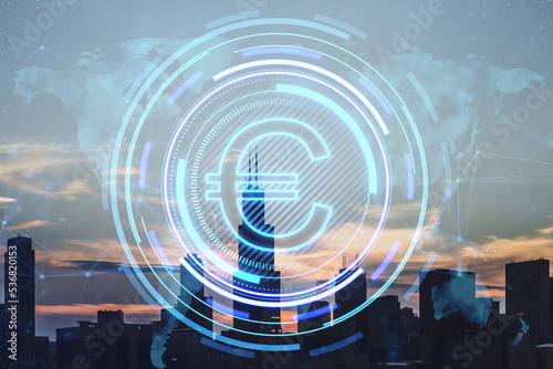 Creative glowing round euro icon and map hologram on blurry city view background. Finance, currency and global business technologies concept. Double exposure.