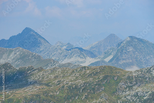 The mountains of the Brembana valley during a summer day, seen from the San Marco pass, Italy - July 2022. © Roberto