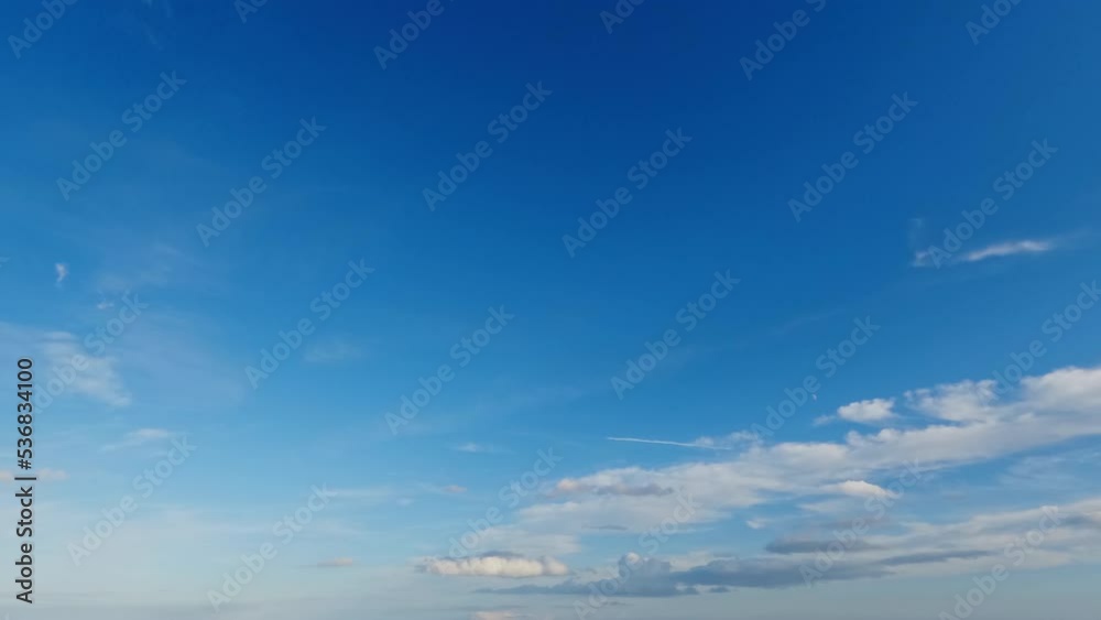 Clouds that go to infinity in a tranquil blue sky Clouds that go to infinity in a tranquil blue sky