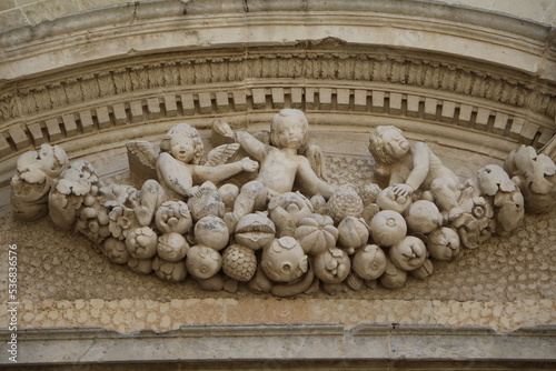 Fototapeta Putti at Lecce Cathedral at night, Italy