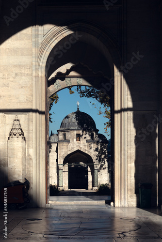 Archways in the courtyard of the Suleymaniye Mosque. Deep shadows on the wall.