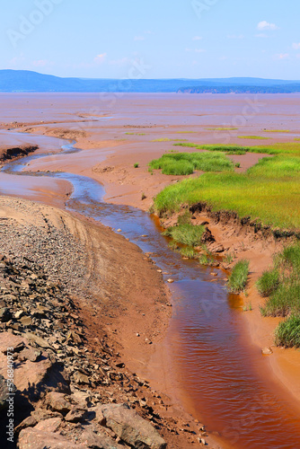 Sandy shore at low tide in the Bay of Fundy in Sackville New Brunswick, Canada