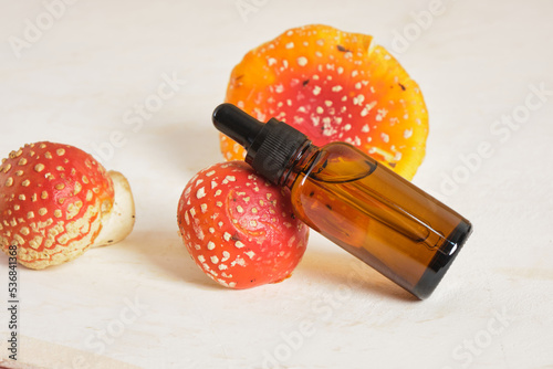 fly agaric red and glass amber dropper bottles photo